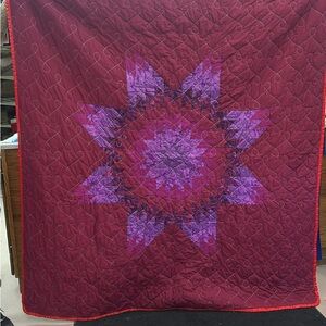 Elegant Purple and Red Star Quilt